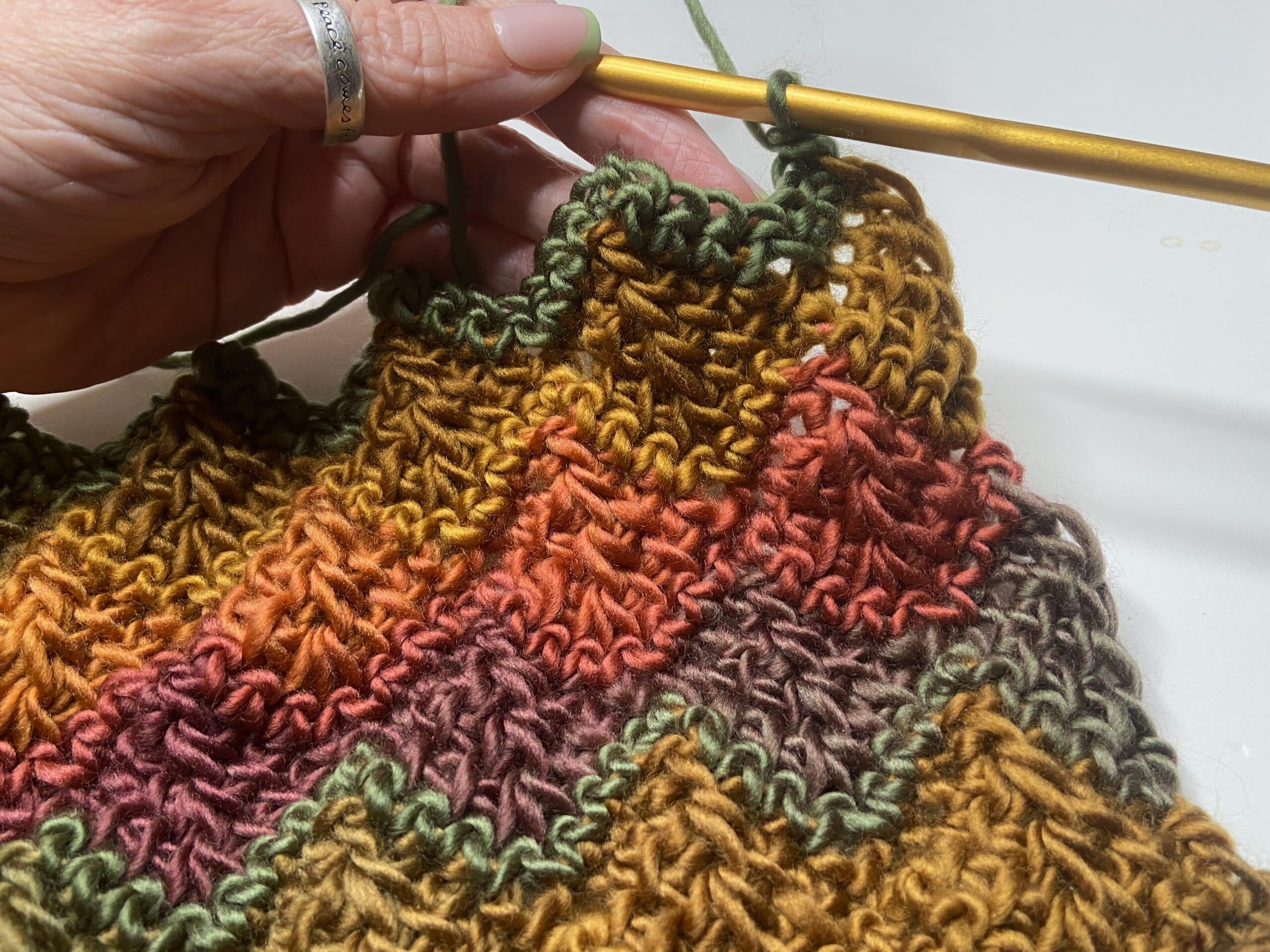 Tunisian Dragon Scales Scarf in Loops & Threads Facets in progress shot.