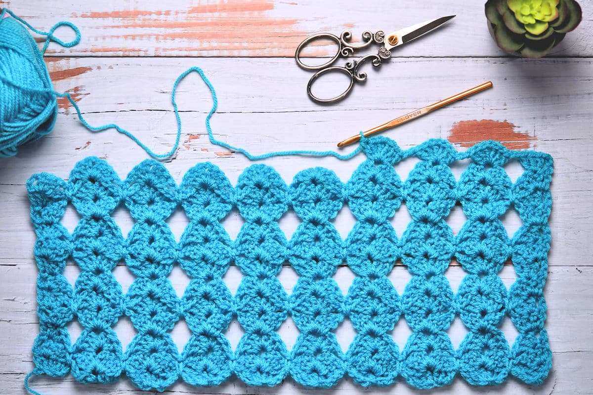 overhead progress shot of Rainbow Gumballs Rectangle Crochet Shawl at MakeItCrochet