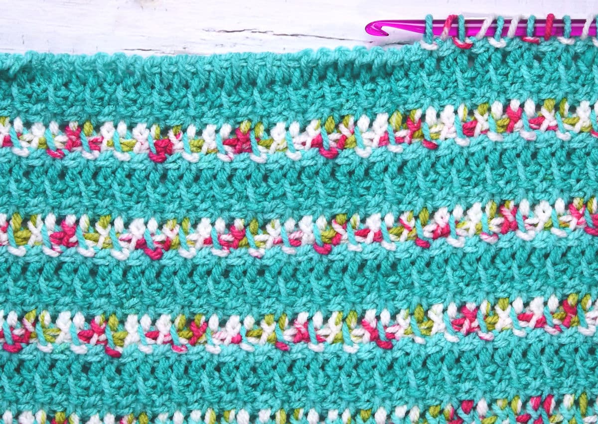 progress shot of Tunisian crochet baby blanket with knitpro spectra hook