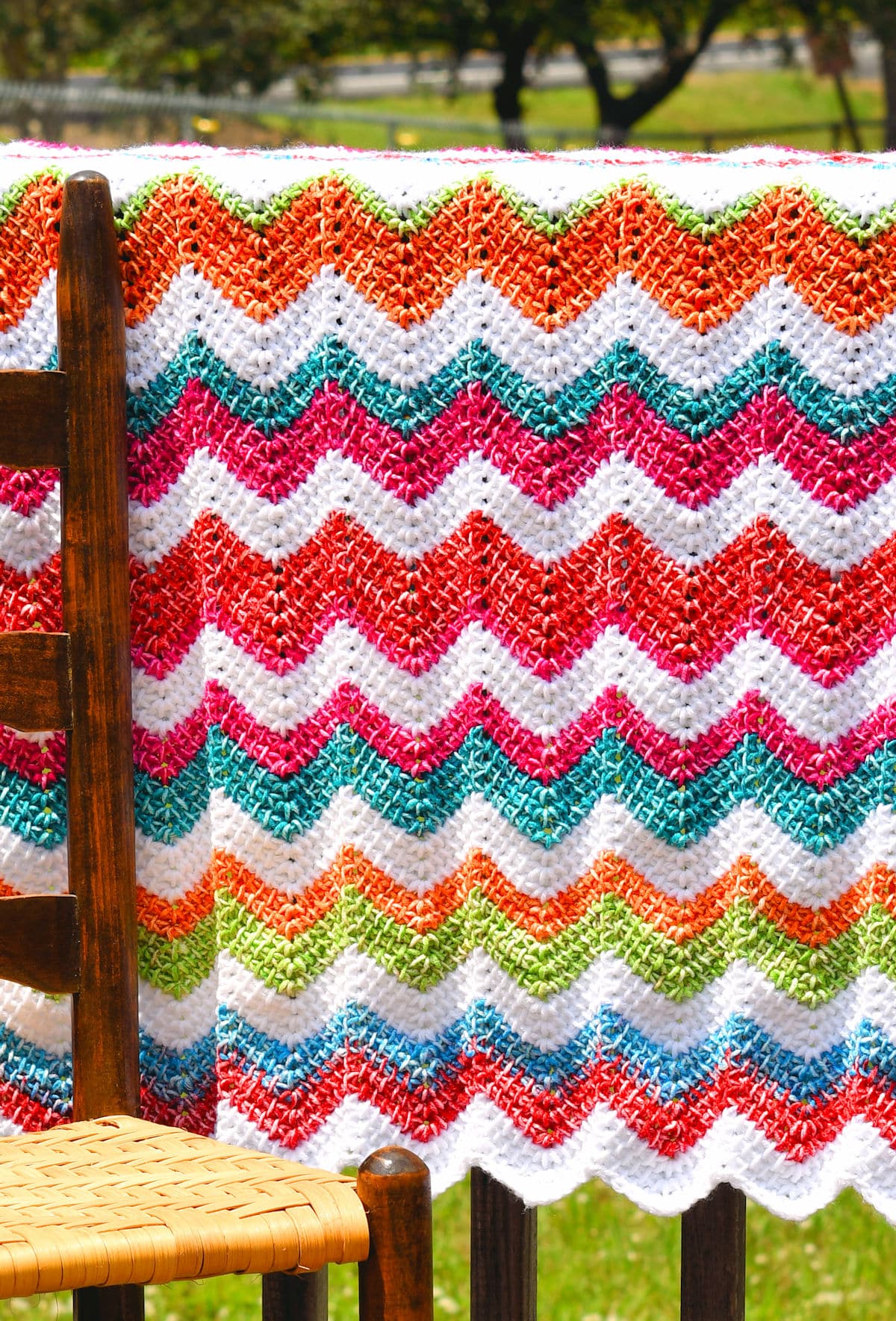 Easy Tunisian Crochet Ripple Baby Blanket by Kim Guzman in Mandala Ombre