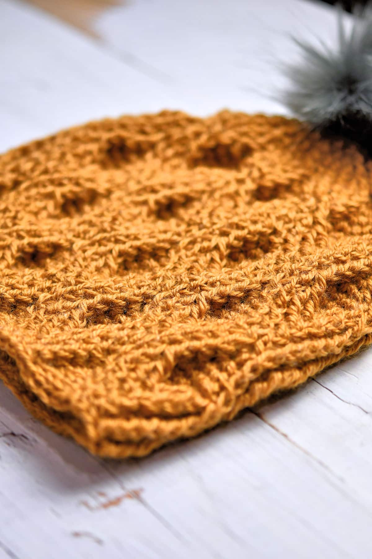 Side view of Raised Diamonds Beanie crochet pattern by Kim Guzman