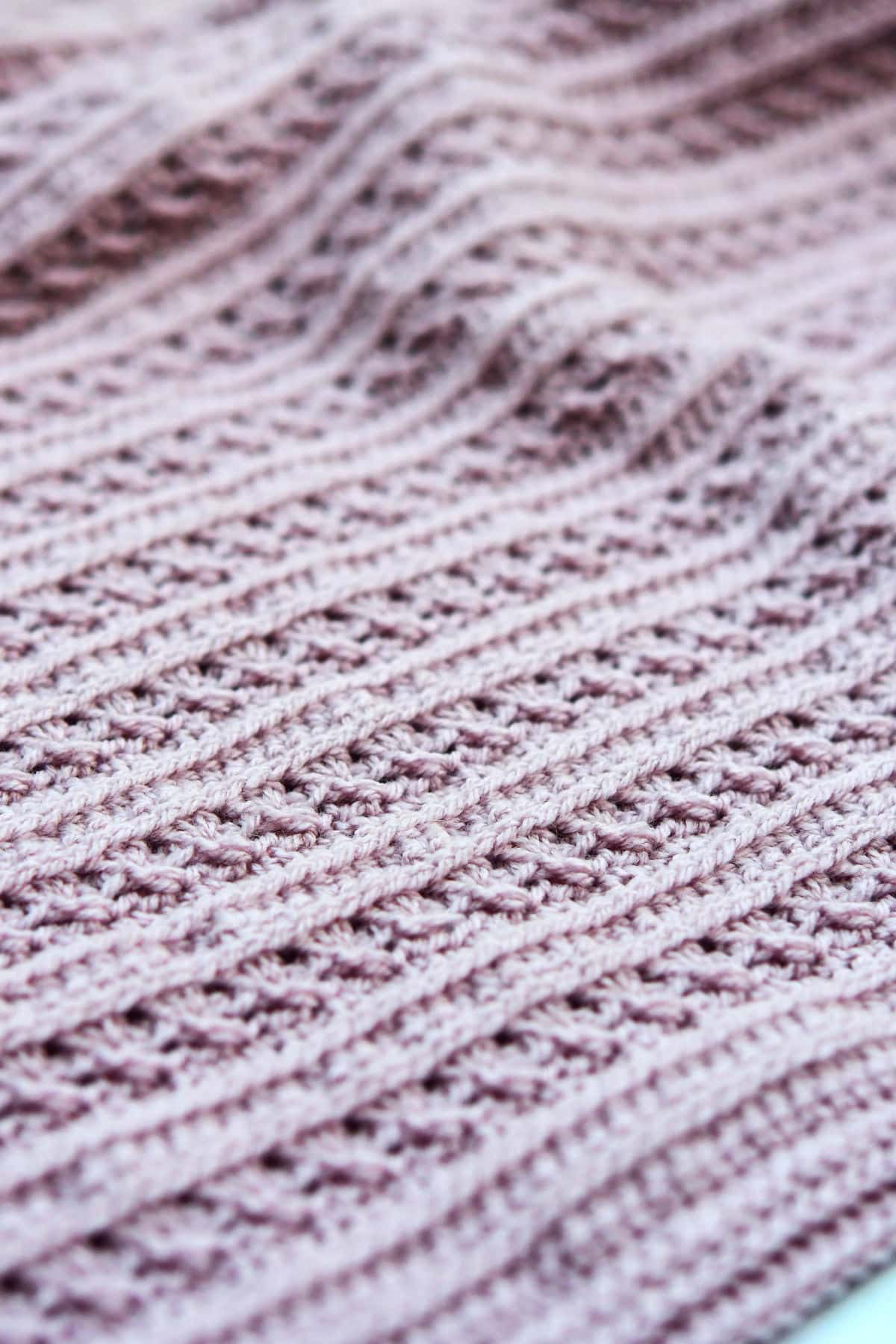 closeup of free crochet baby blanket pattern to better show delicate lace