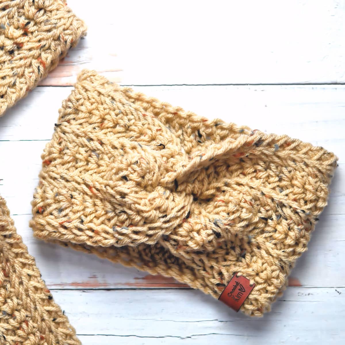Tunisian twisted headband free crochet pattern by Kim Guzman