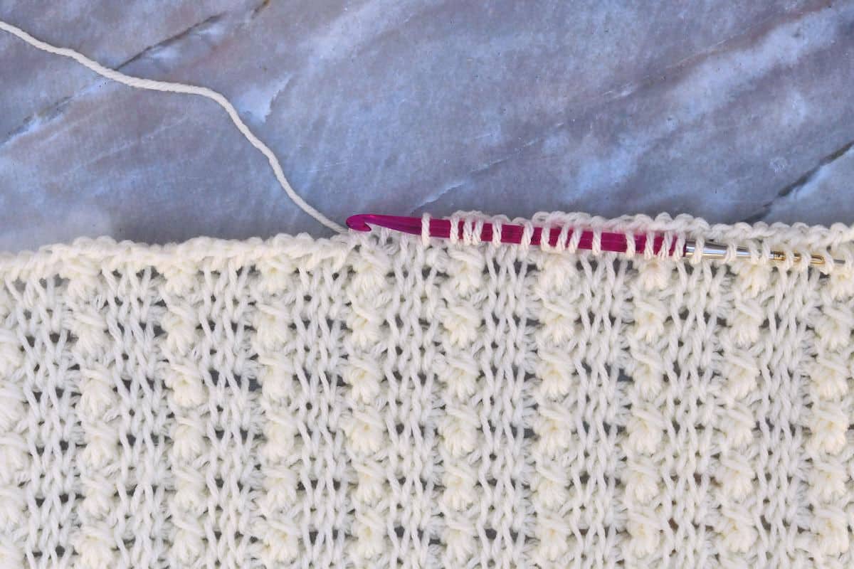 Tunisian Mini Cables Afghan while on the hook sample