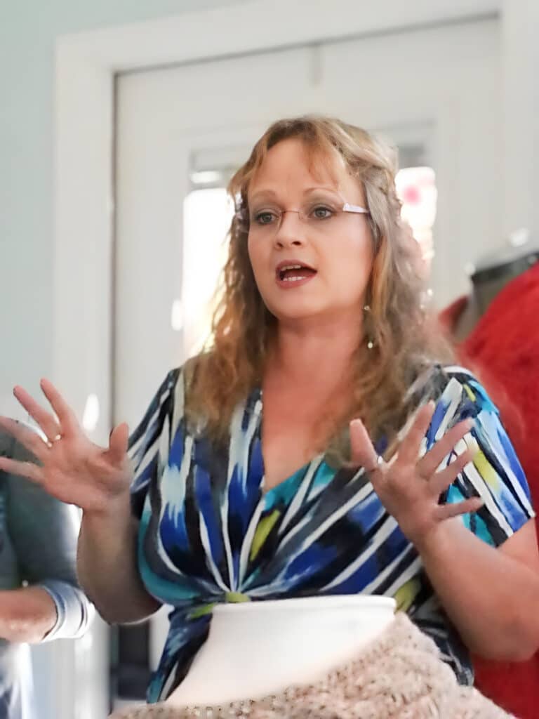 Kim Guzman teaching a Tunisian crochet class