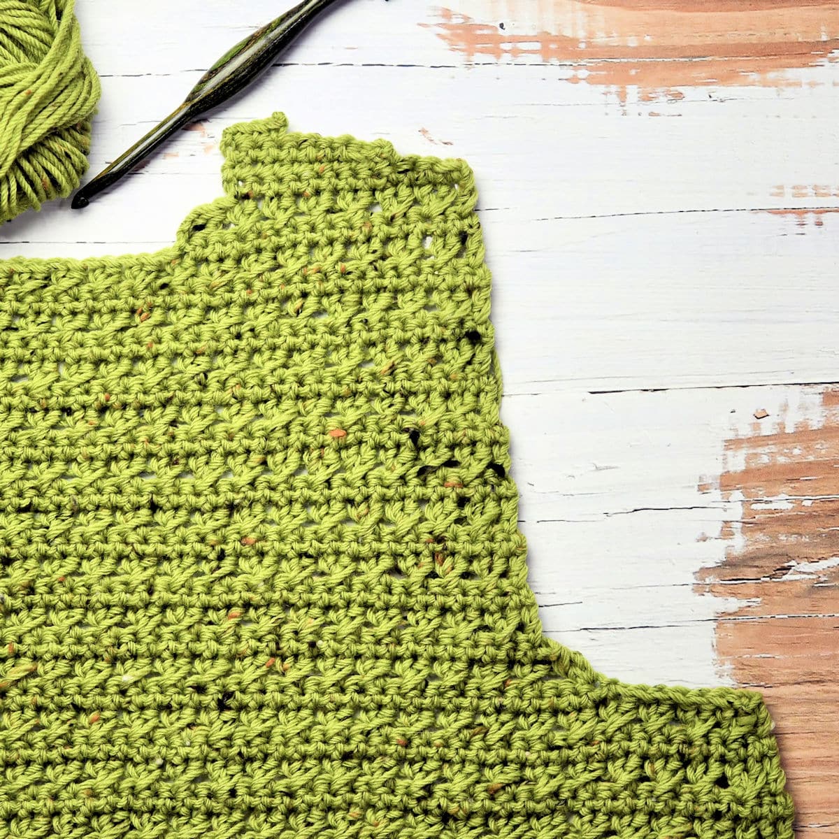 process shot of incomplete crossed stitch women's button front cardigan