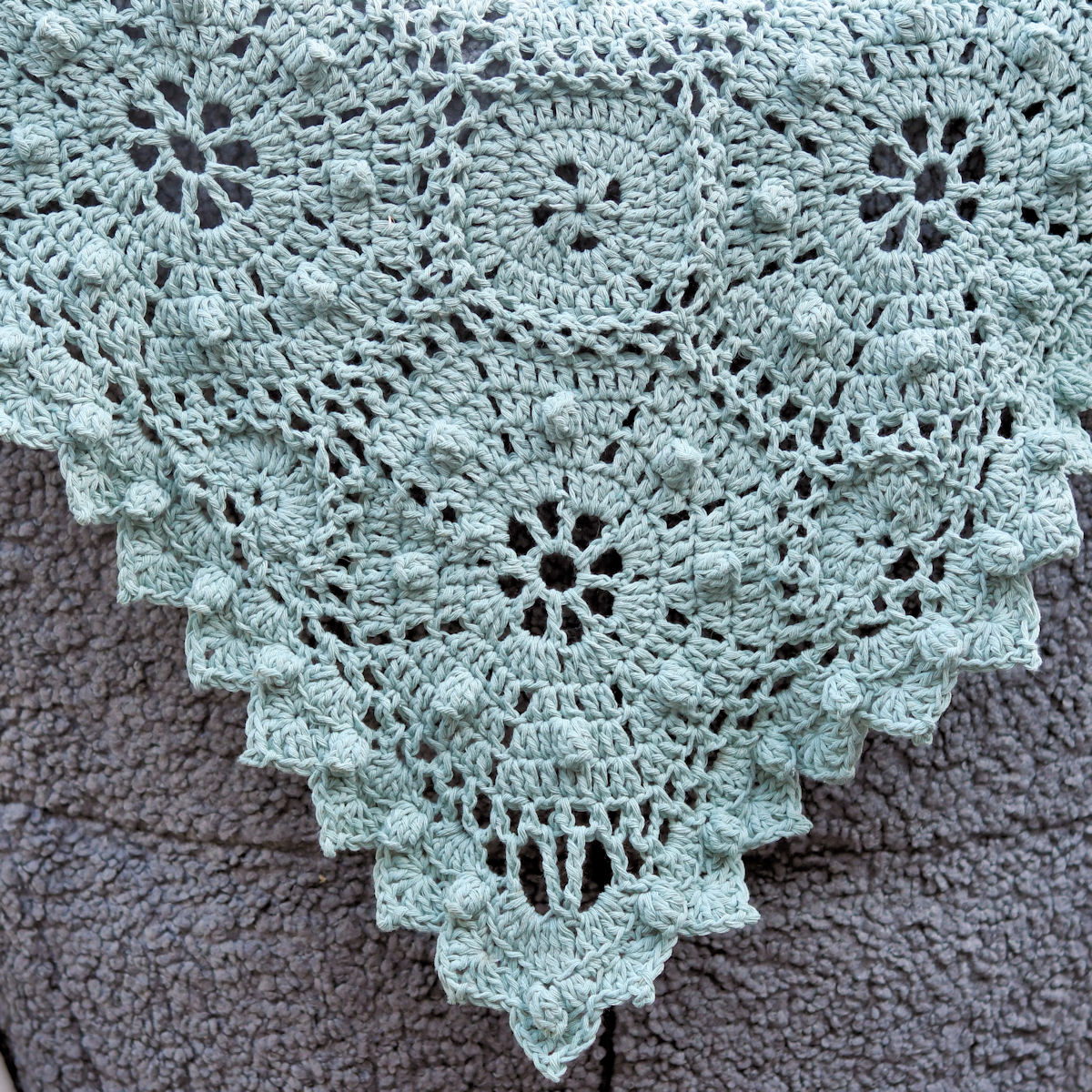 closeup of border of romantic Octagon Lace Throw