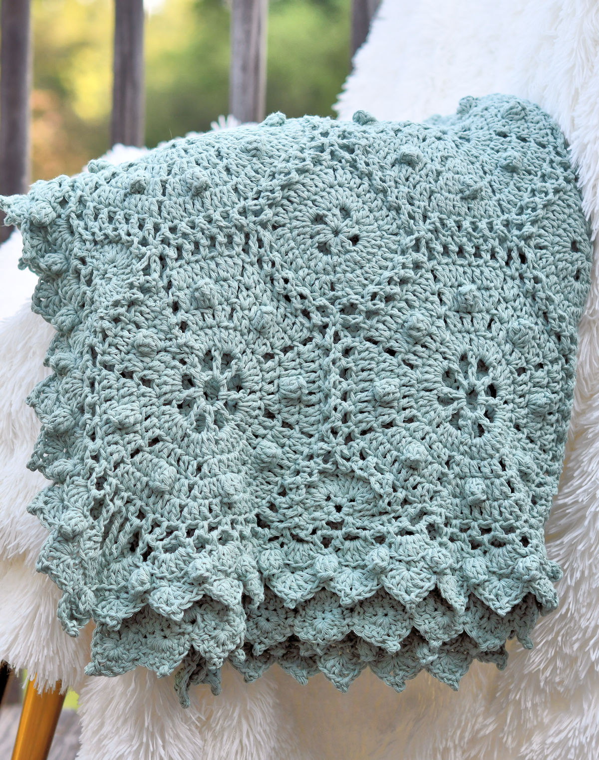 Crochet octagons in join as you go blanket, draped over a chain