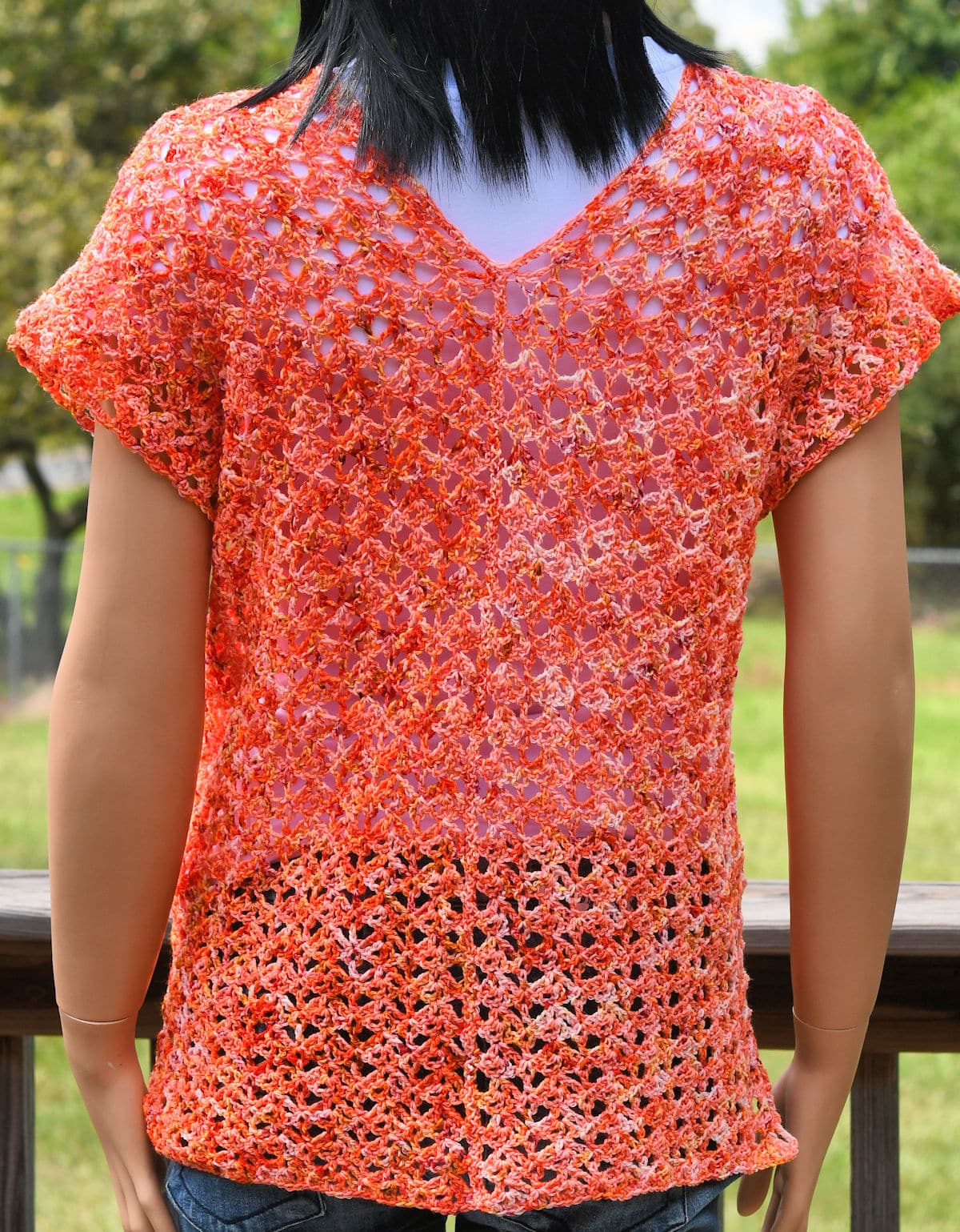 Back view of womens lace sock yarn top showing the seamed construction.